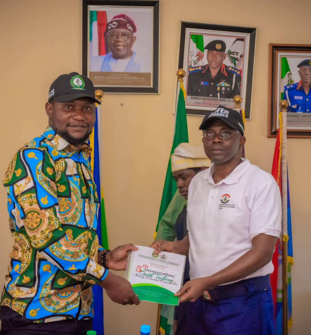 L-R: National President, National Association of University Students, NAUS, Obaji Marshal in a warm handshake with the Commander, NSSRCC; Commandant Hammed Abodunrin PhD fdc