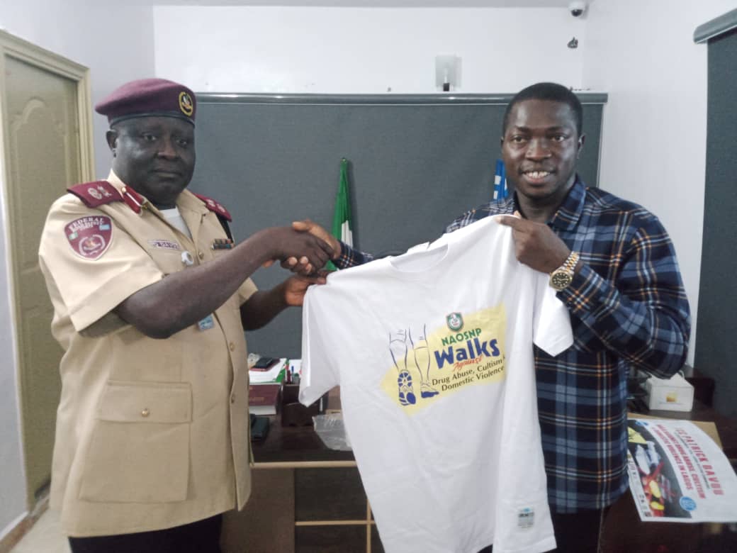 New Sector Commander, FRSC Lagos Sector Command, CC Patrick Davou Dung receiving NAOSNP Walks' Advocacy Material from the President, National Association of Online Security News Publishers, NAOSNP Comrade Oki Samson during NAOSNP President's visit to the Sector Commander