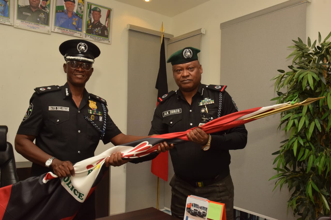 L-R: Outgoing Commander, MOPOL 20 Ikeja/Commander, Anti-Pipeline Vandalization Unit, Force Headquarters, Abuja, DCP Bayonle Kafar Suleiman handing-over to the New Commander, MOPOL 20 Ikeja, ACP Idris Abdullahi Abubakar during the hand-over and take-over at the MOPOL 20 Headquarters, Ikeja.