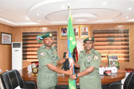 L-R: outgoing GOC, 81 Division, Nigerian Army, Major General Muhammed Usman handing-over to the new GOC, 81 Division, Major General Farouk Umar Mijinyawa 
