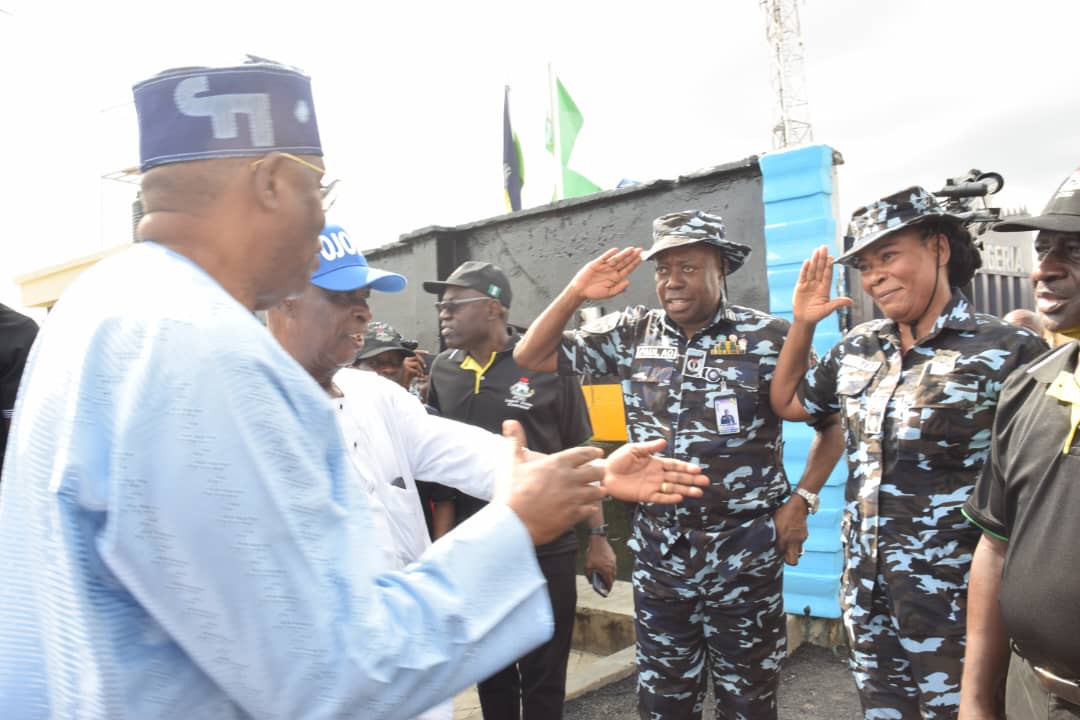 Honourable James Abiodun Faleke being welcomed by Commander, Area F, ACP Paul Azuka Okafor and DPO, Ojodu Division, CSP Elizabeth Oluwatoyin Opadola for the Commissioning of PCRC Building, Ambulance Bus Station, other Projects facilitated by Hon. James Faleke at Ojodu Police Division 