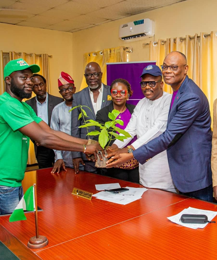 Polaris Bank ED, Chris Ofikulu & TASUED Dep VC, Prof. Adekunle Adeogun receiving the 3 tree species from the NCF Project Officer in Ijagun, Ijebu Ode, Ogun State on Monday.