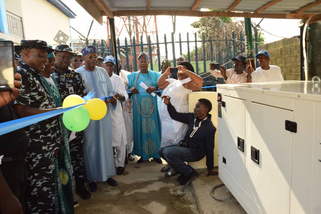Commissioner of Police, Lagos State Command, CP Adegoke Fayoade commissioning the brand new 20KVA Generator facilitated by Hon. James Abiodun Faleke as the Commander, Area F, ACP Paul Azuka Okafor; Hon. James Faleke and others looks on...