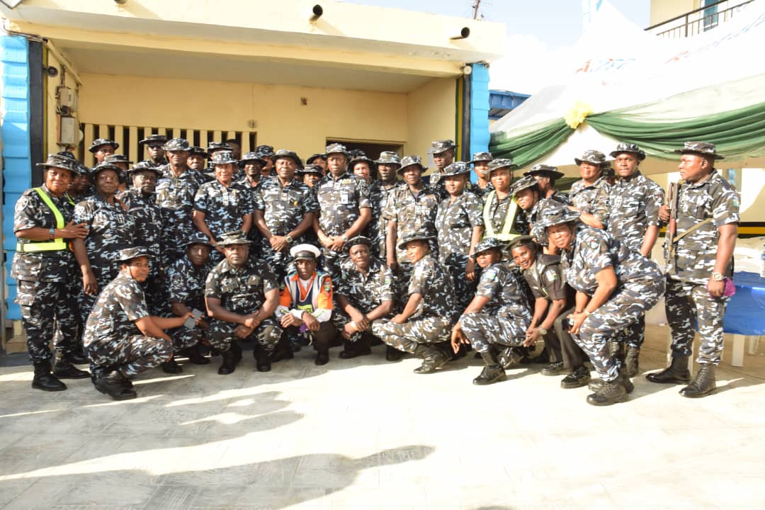 Commissioner of Police, Lagos State Command, CP Adegoke Fayoade; Commander, Area F, ACP Paul Azuka Okafor and DPO, Ojodu Division, CSP Elizabeth Oluwatoyin Opadola in a group picture with the Police officers of Ojodu division during the commissioning of Ojodu PCRC Building, Ambulance Bus Station, 20KVA Generator and others facilitated by Hon. James Faleke at Ojodu Police Division. 