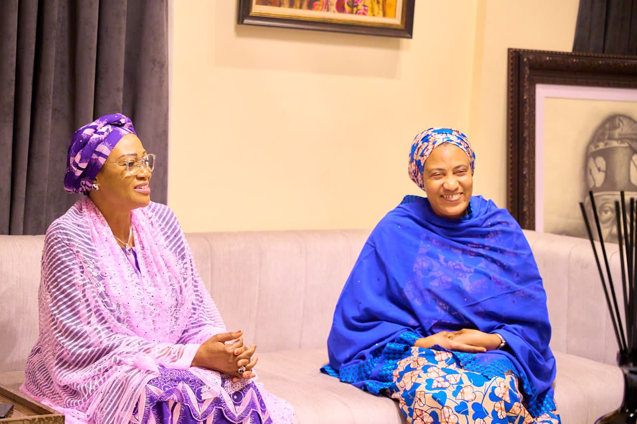 L-R: First Lady of the Federal Republic of Nigeria, Senator Oluremi Tinubu with the wife of the Vice President, Hajia Nana Shettima when the First Lady paid a condolence visit to Hajia Shettima over the death of her mother which occoured on Sunday 23rd June. The visit was in Abuja on Tuesday 2nd of July.