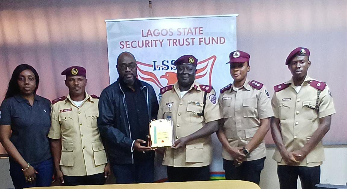 Executive Secretary/CEO, Lagos State Security Trust Fund, LSSTF, Dr. Abdurrazaq Balogun (3rd left) receiving a souvenir from the Sector Commander, FRSC Lagos Sector Command, CC Patrick Davou Dung (3rd right); Secretary of LSSTF, Mrs. Ada Onyeka (left); Deputy PRO, FRSC Lagos Sector Command, RC Jesutomipe Mala (2nd right); and other officers during the Sector Commander’s courtesy visit to LSSTF ES..
