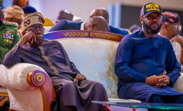 President Bola Ahmed Tinubu and his Son, Mr. Seyi Tinubu (right).