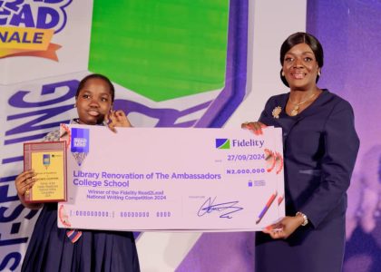 L – R: Winner, Miss Iremide Ogunyemi of The Ambassadors’ College, Ota, Ogun State; and Executive Director, South Business, Fidelity Bank Plc, Mrs. Pamela Shodipo; at the prize presentation ceremony of the Fidelity Bank-organised Read2Lead Writing Competition held in Lagos recently.