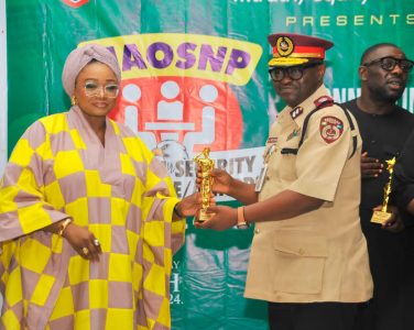 L-R: Honourable Minister of State for Police Affairs, Hajia Imaan Sulaiman-Ibrahim presenting the NAOSNP Man of the Year Award to Corps Marshal, Federal Road Safety Corps, FRSC, CM Shehu Mohammed ably represented by Assistant Corps Marshal, ACM Adeoye Irelewuyi during the NAOSNP National Security Conference and Awards held at Oriental Hotel, Victoria Island, Lagos.