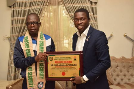 Governorship Candidate, People Democratic Party, PDP, Chief Agboola Alfred Ajayi receiving NAOSNP Certificate of Credence from the President, National Association of Online Security News Publishers, NAOSNP, Oki O. Samson during NAOSNP President's courtesy visit to Chief Agboola Ajayi at his resident in Akure and Security Assessment Tour in Ondo State ahead of the November 16th Ondo State Gubernatorial election.