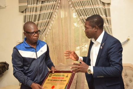 L-R: Governorship Candidate, People Democratic Party, PDP, Chief Agboola Alfred Ajayi while welcoming the President, National Association of Online Security News Publishers, NAOSNP, Oki O. Samson during NAOSNP President's Courtesy visit and Security Assessment Tour to Ondo State