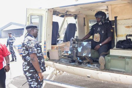 Commissioner of Police, Lagos State Command, CP Fatai Tijani accessing the Police Airplane before the Aerial Surveillance Patrol across the state at the Nigeria Police Air Wing, Ikeja 